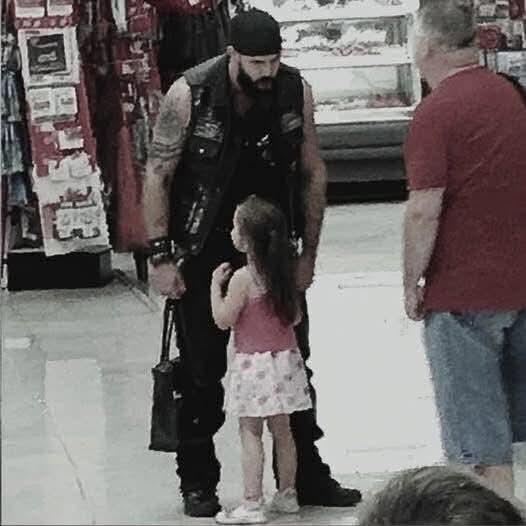 Mute girl rushes to scary biker at Walmart knowing his secret