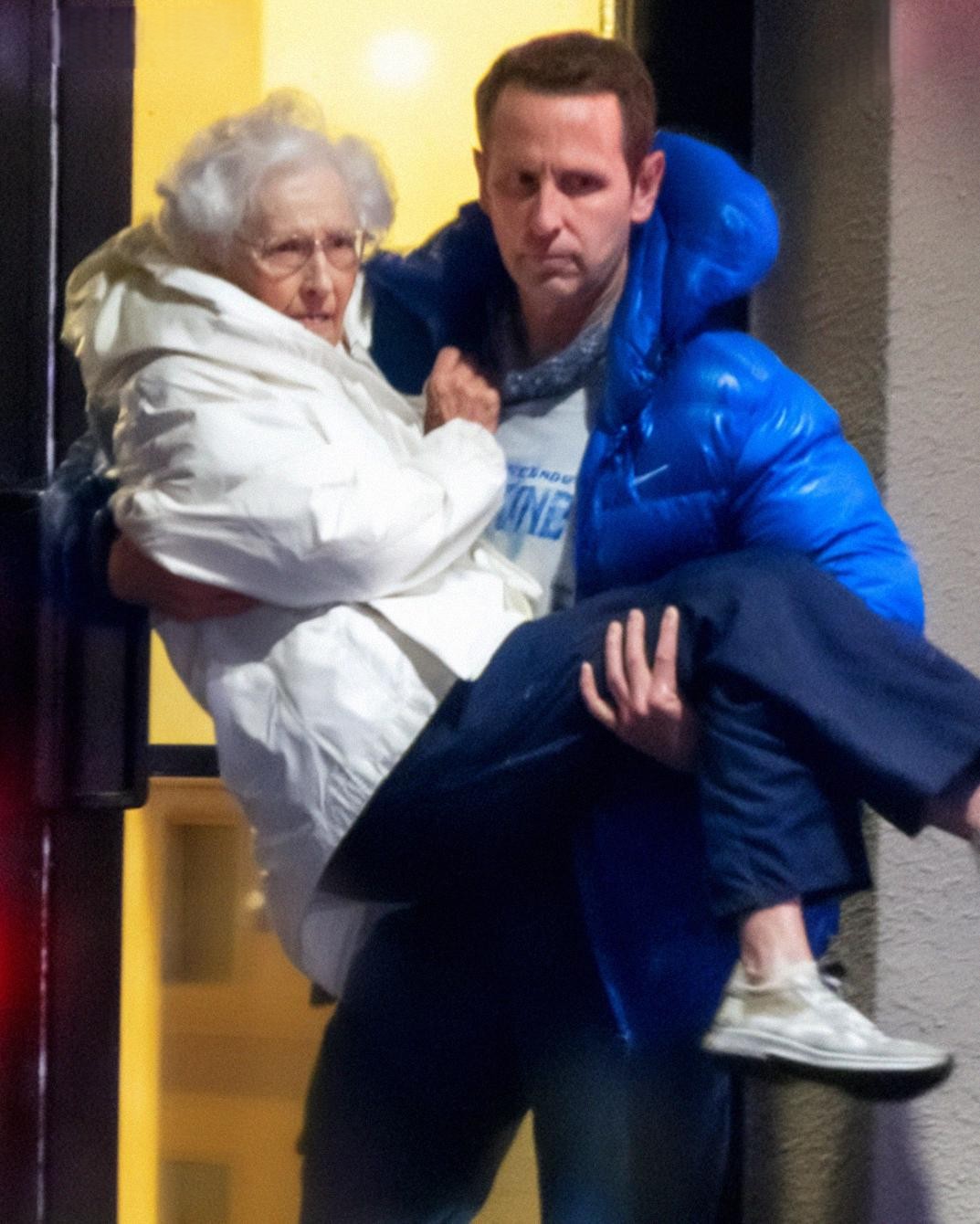 I Carried My Elderly Neighbor down Nine Flights During a Fire – Two Days Later, a Man Showed Up at My Door and Said, You Did It on Purpose!