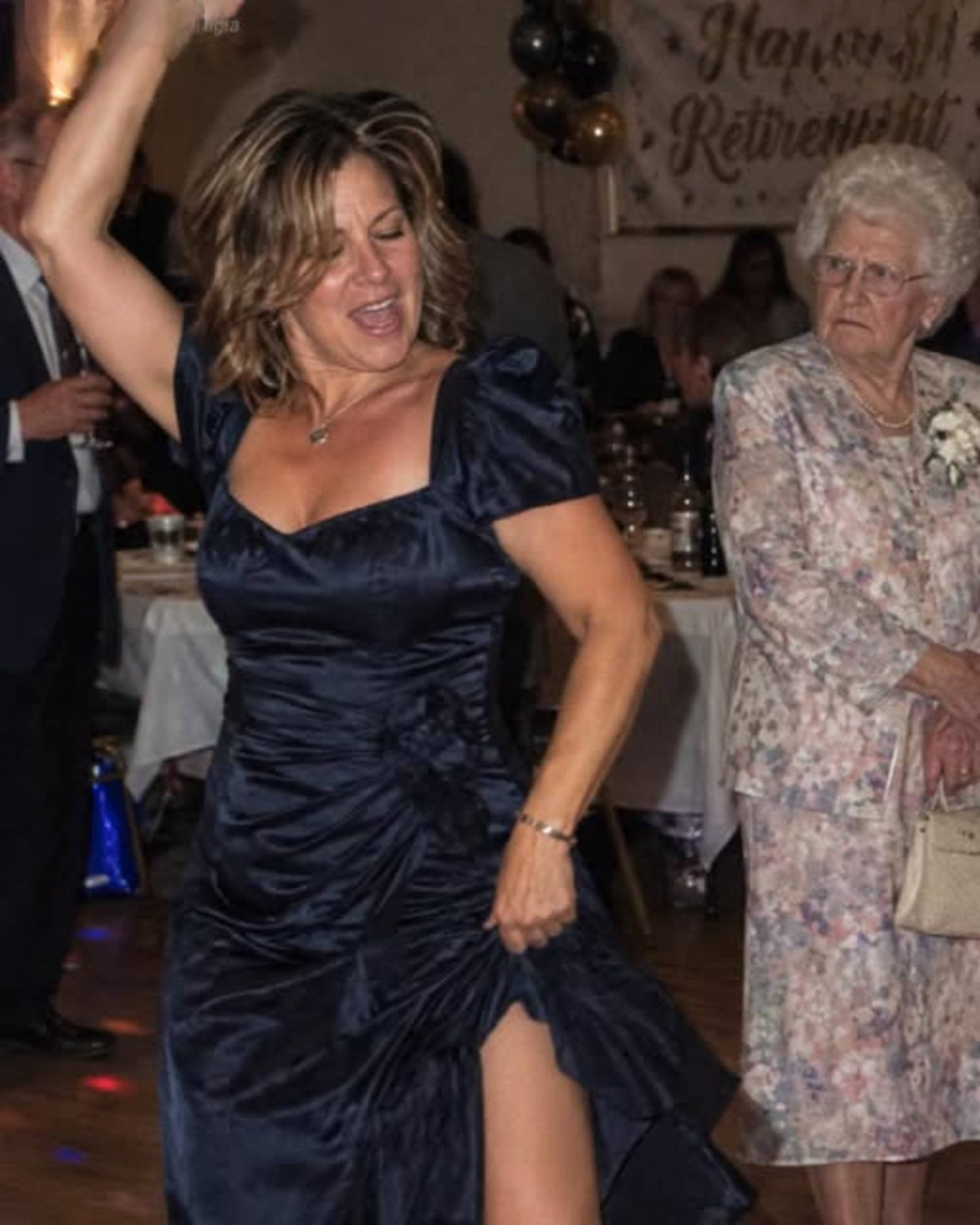 My MIL Laughed at My $30 Thrift-Store Dress at My Husband’s Retirement Party – Then His Boss Asked Her One Question
